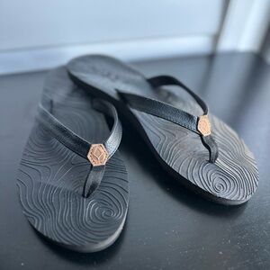 Reef Black Flip Flops with Tan Accent